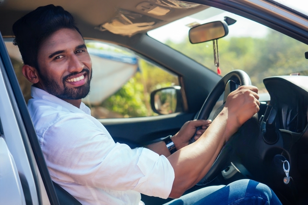 Indian driver smiling